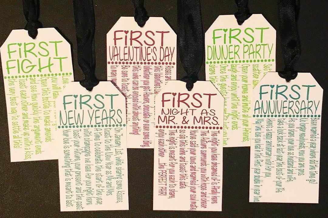 Six white gift tags with colorful text for couple milestones and black ribbons.