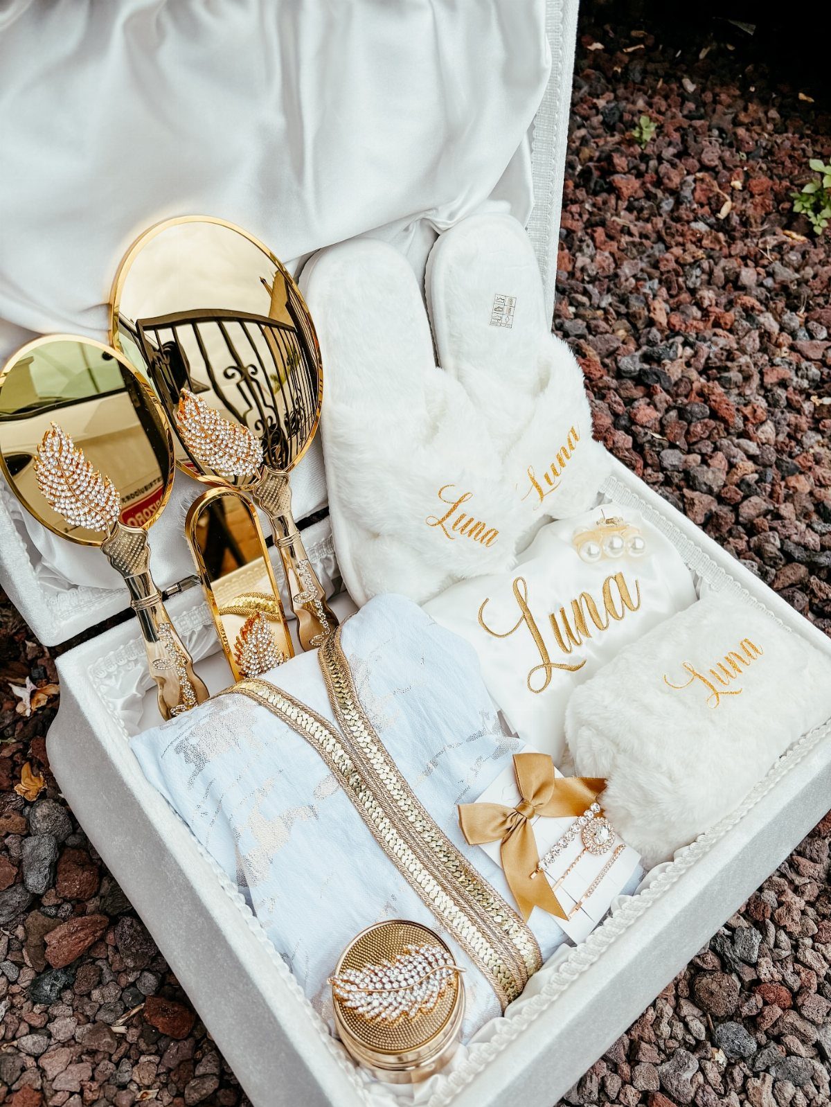 Personalized blue robe and white slippers with gold Luna embroidery in a gift box