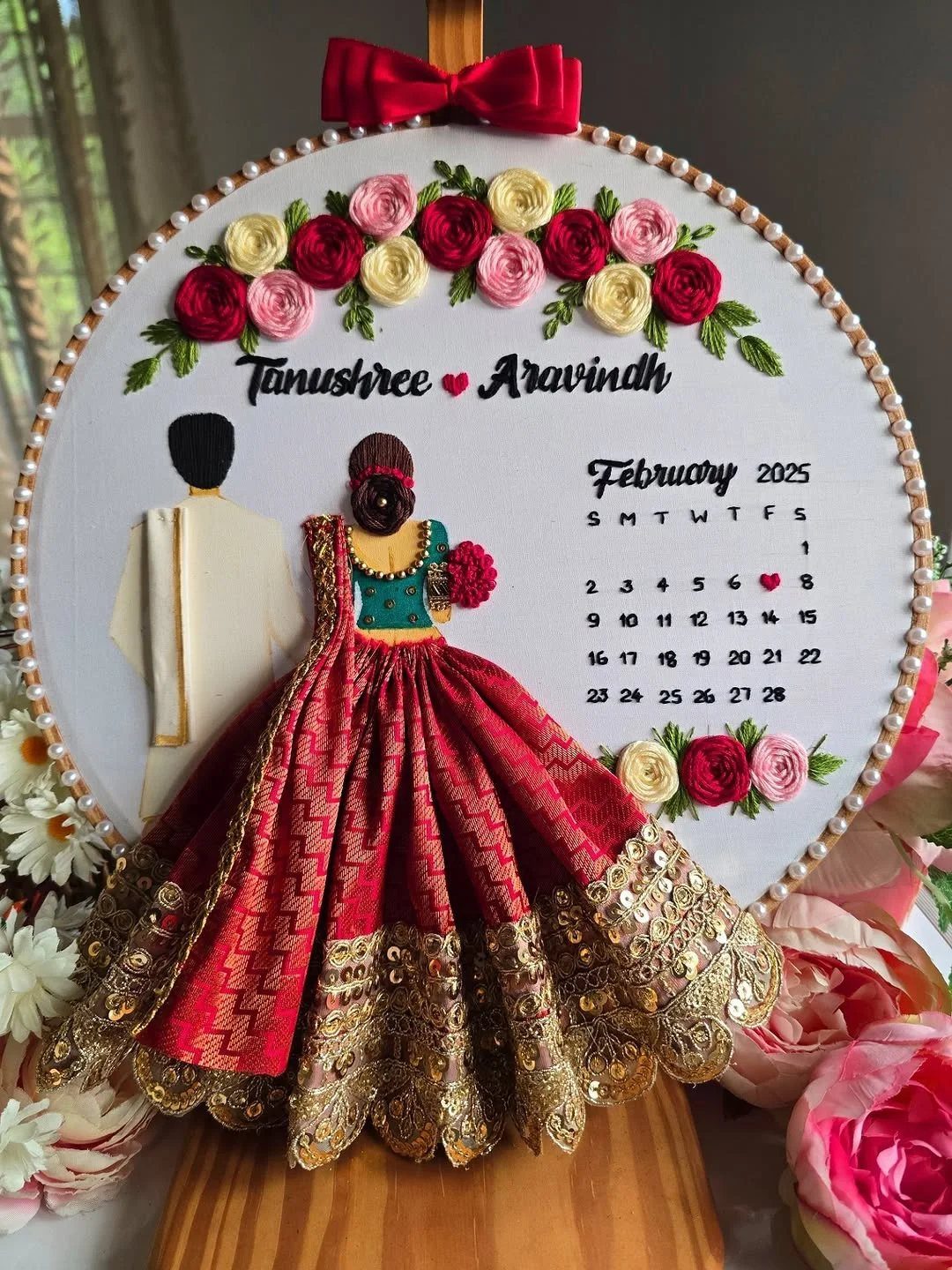 3D fabric wedding couple art in an embroidery hoop with floral decorations