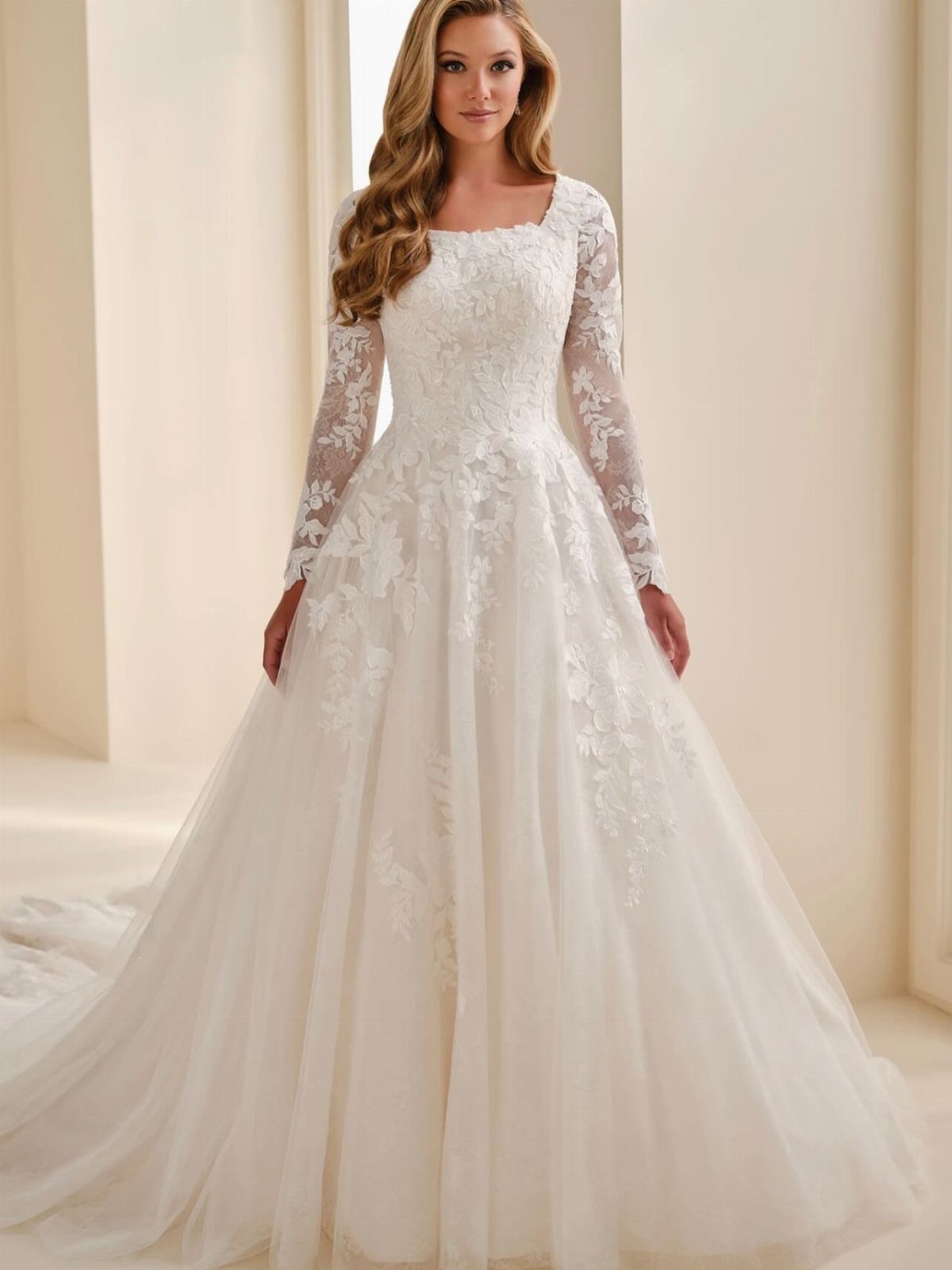 Woman in a white A-line wedding dress with long lace sleeves and floral details.
